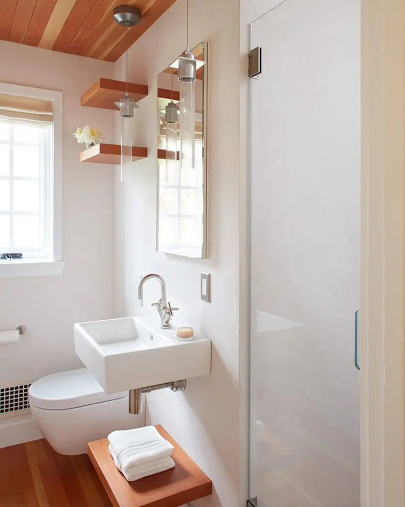 A Narrow Space Was Used To Create This Small Bathroom